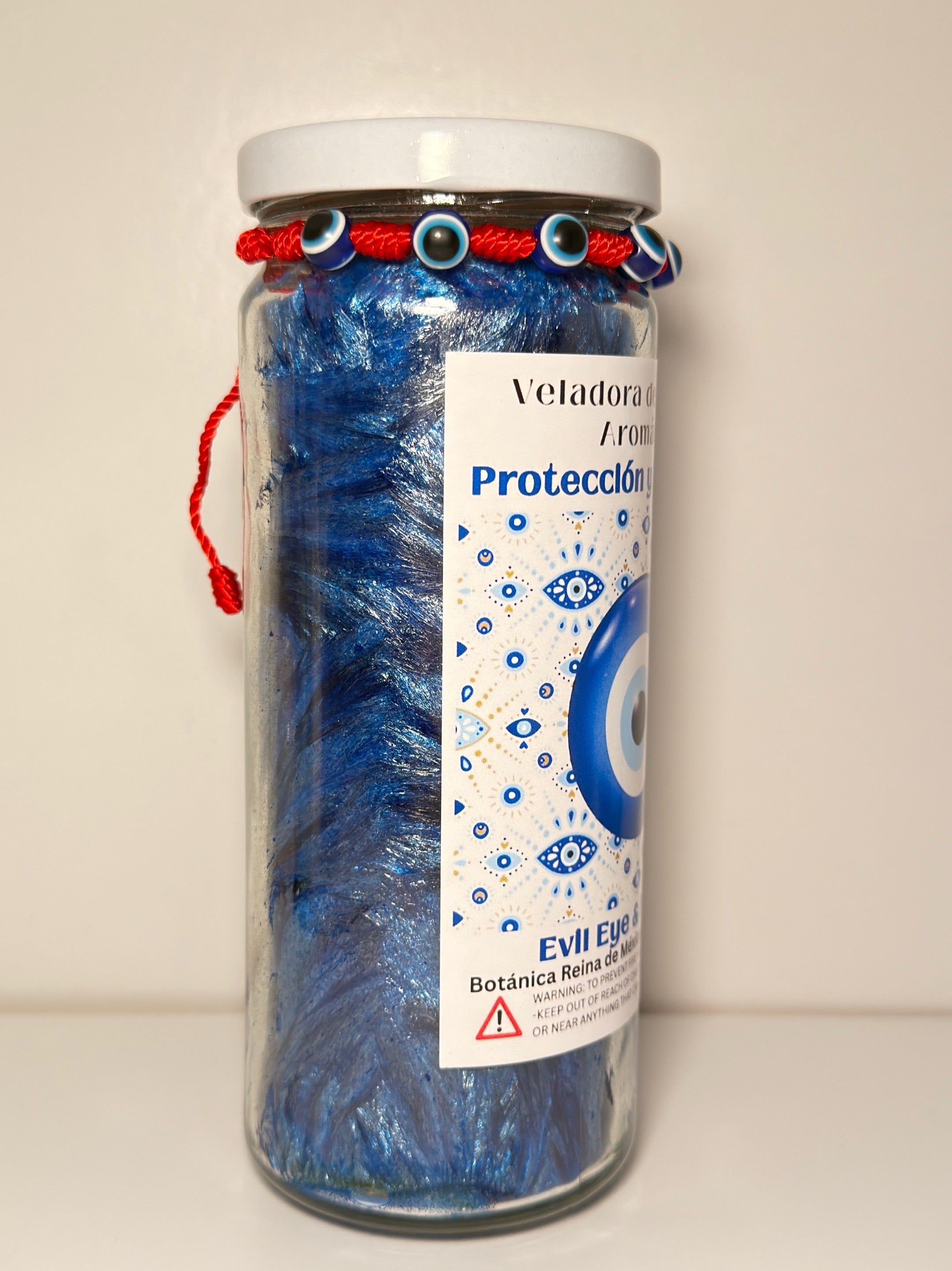 Veladora con pulsera “Protección y Mal de Ojo”