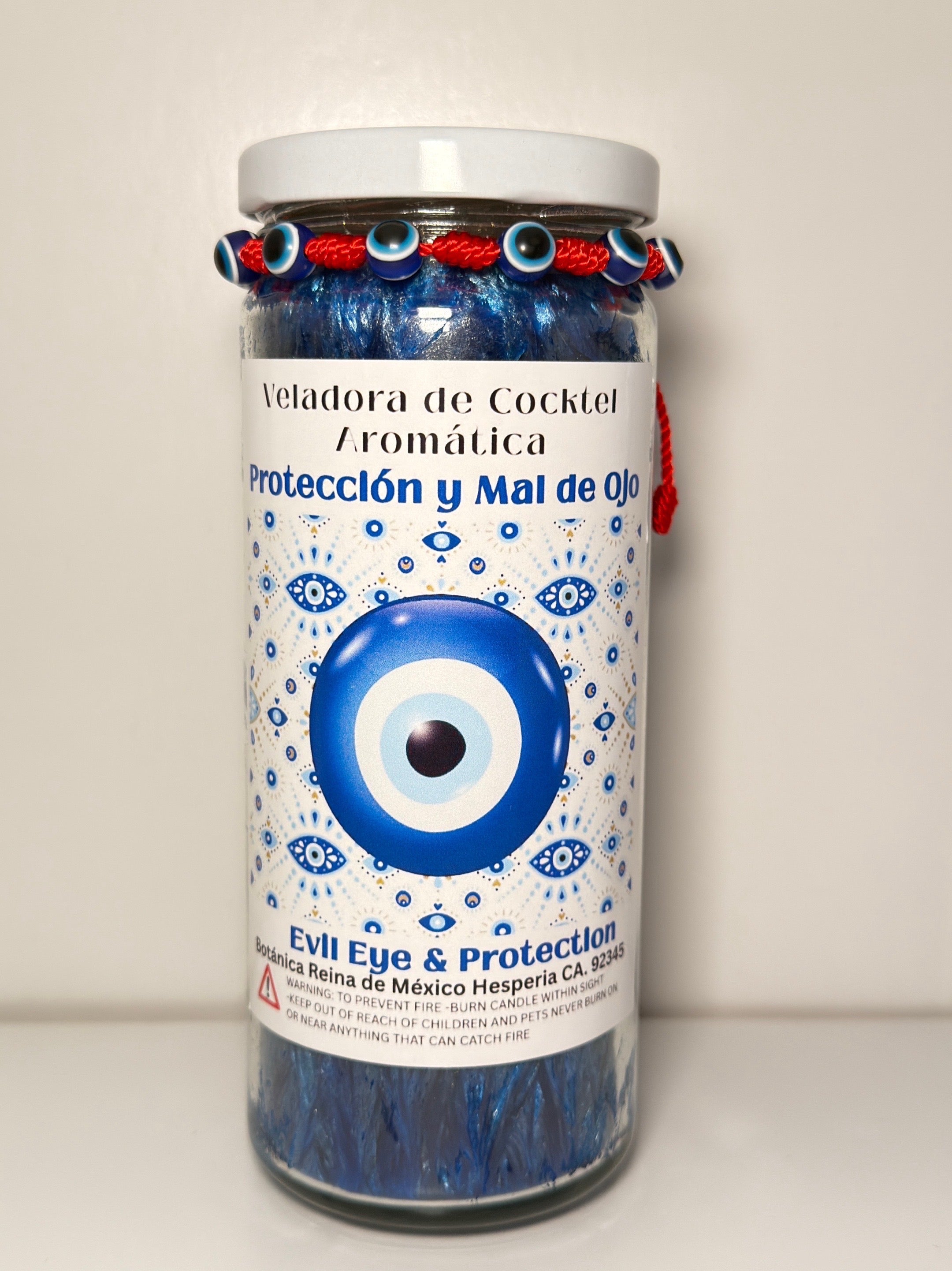 Veladora con pulsera “Protección y Mal de Ojo”